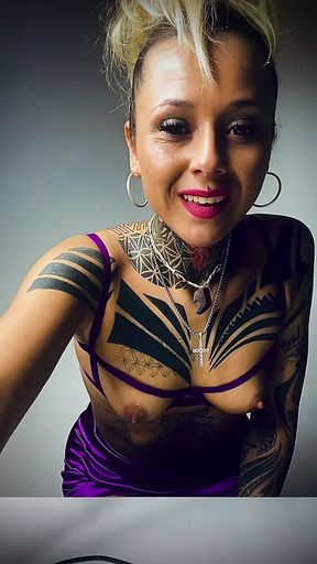 Strip dance, tattooed body